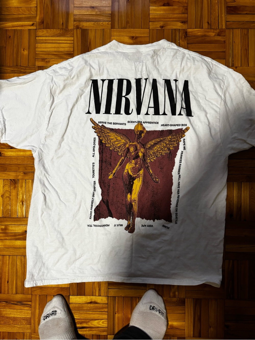 NIRVANA White Tee with Gold Angel and Maroon Block Graphic